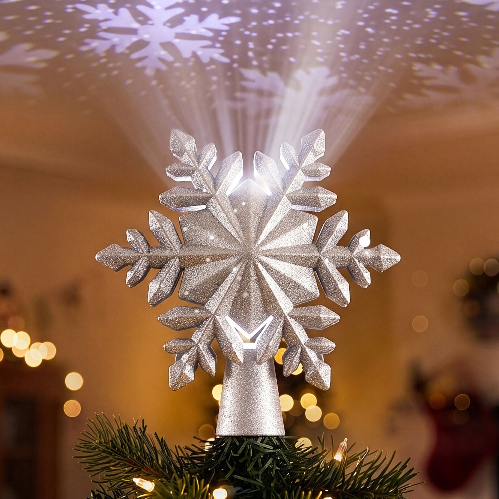 Jingle Jollys Christmas Tree Topper Lighted 360° Rotating Snowflake Projector